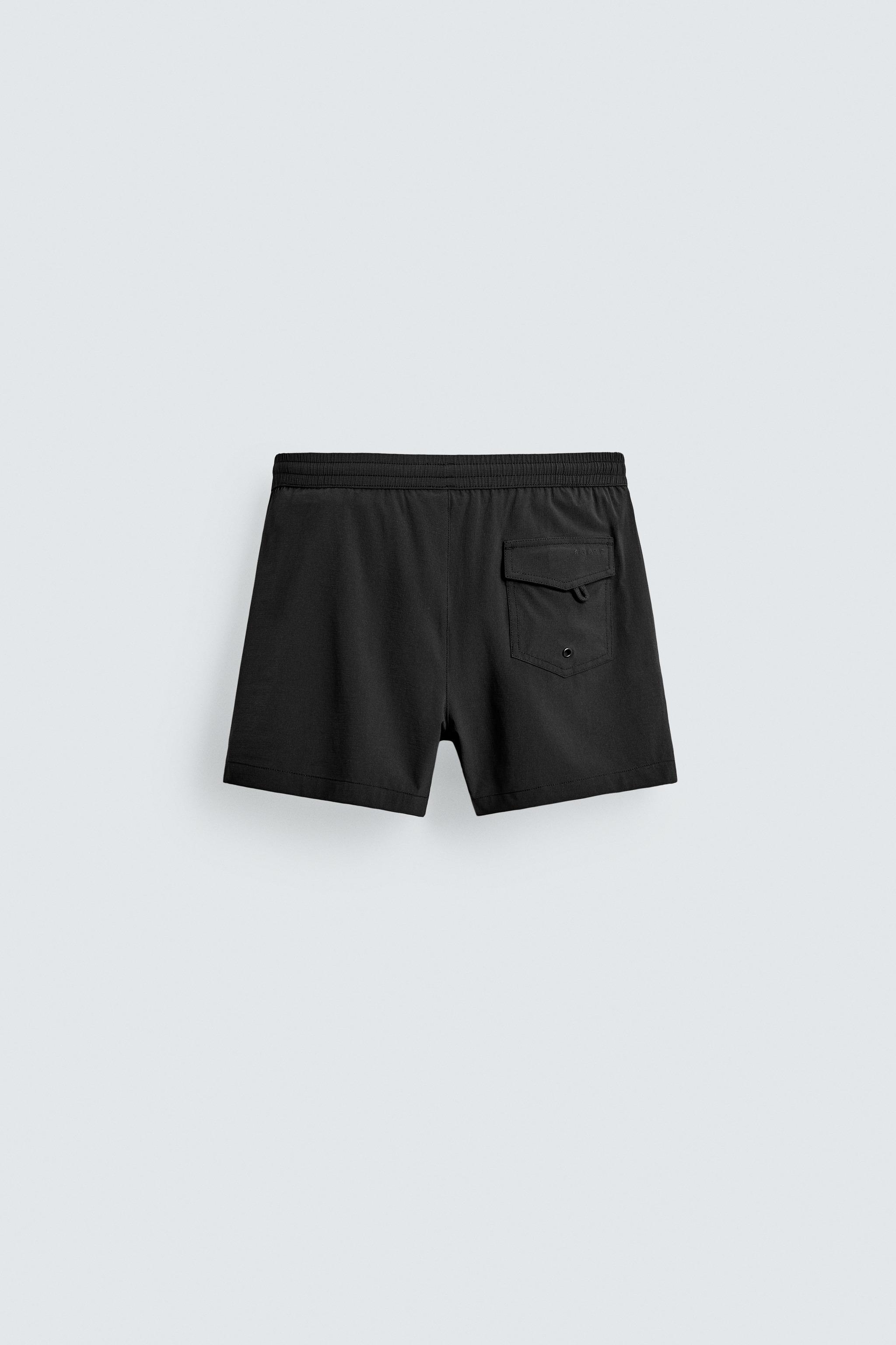 SHORT STRUCTURED SWIMSUIT